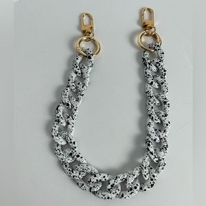 Chain link strap charm acrylic soft smooth finish white with black speckled